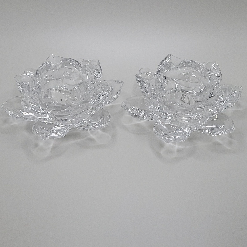 A beautiful pair of heavy glass crystal lotus votive candle holder 5" across.